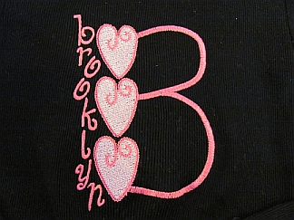 Triple Heart monogram close-up-embroidered, monogram, heart